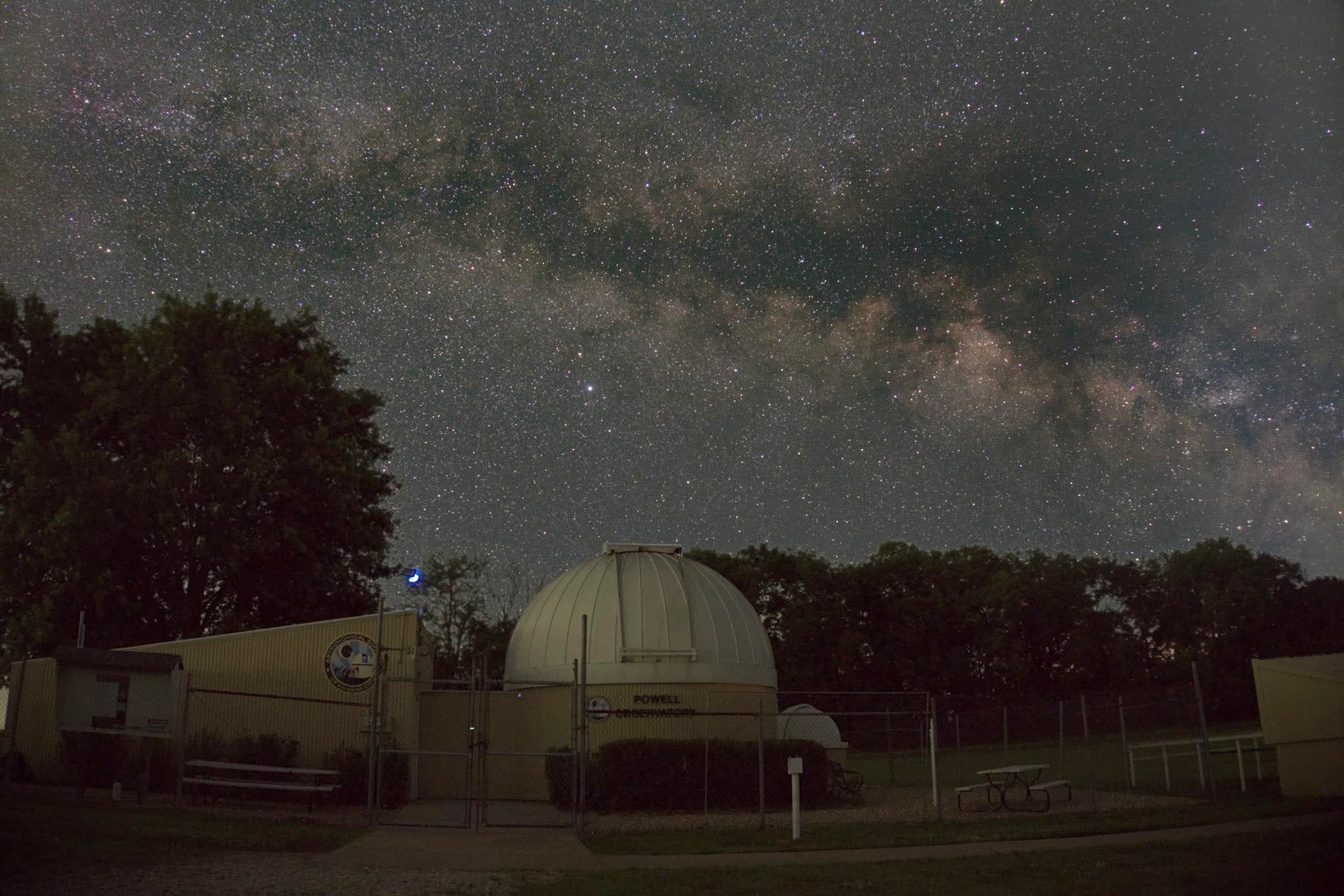 Powell Observatory dome at night under the Milky Way